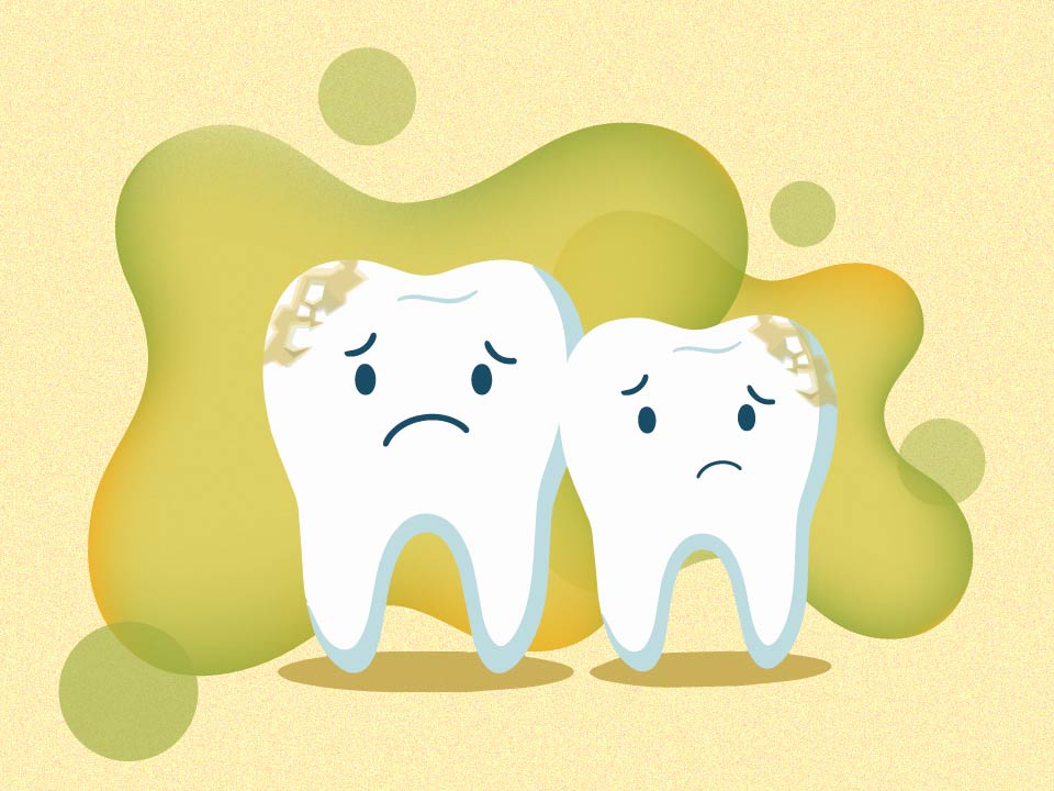 two frowning teeth surrounded by green clouds