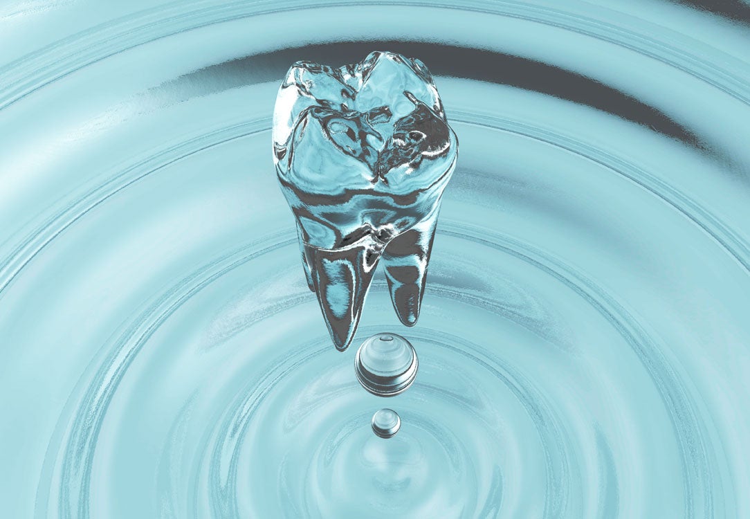 Water drop of tooth shape into water