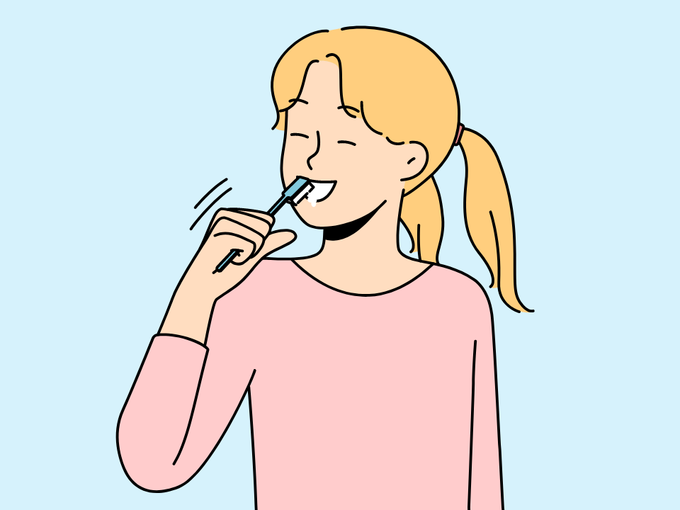 Blonde girl brushing teeth