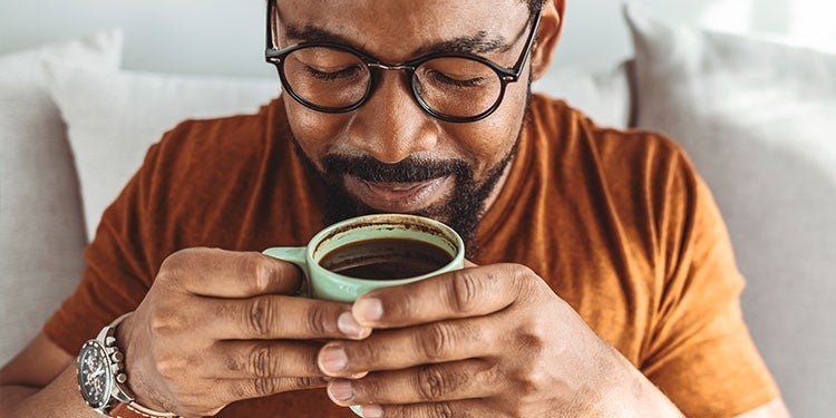 Male drinking Coffee