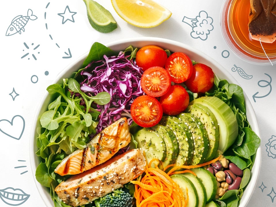 salad with fish and an assortment of vegetables