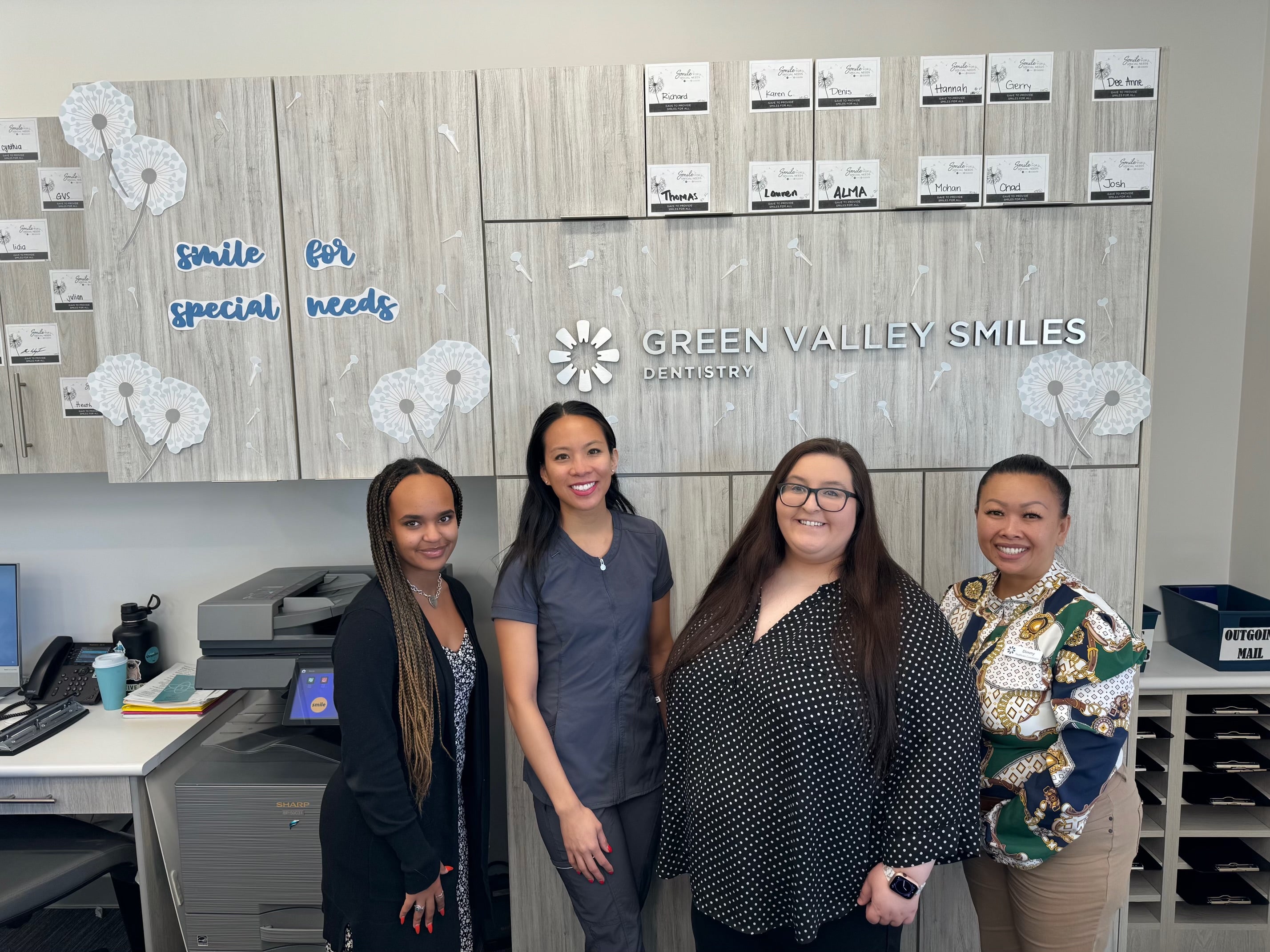 Dentist with patient in chair