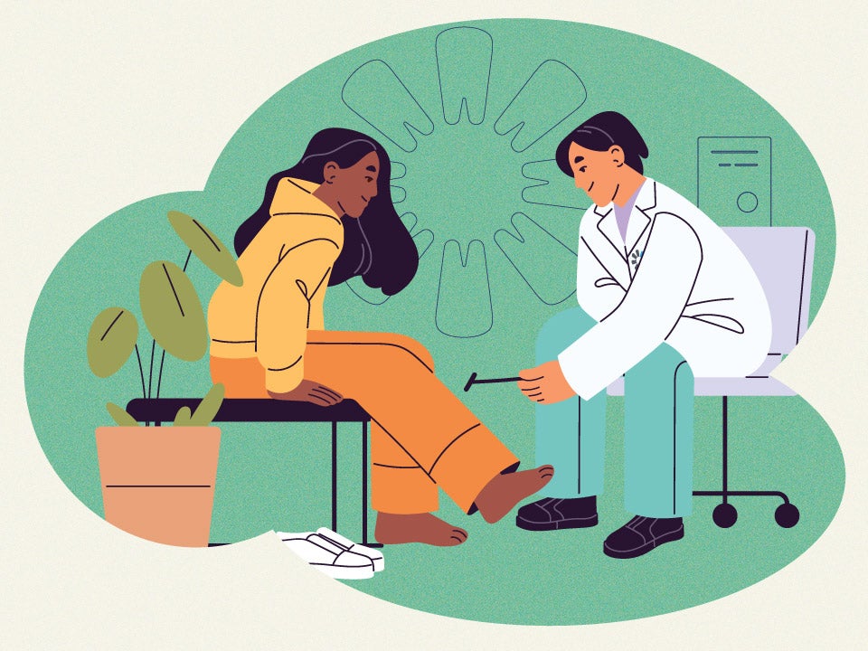 doctor examining patient